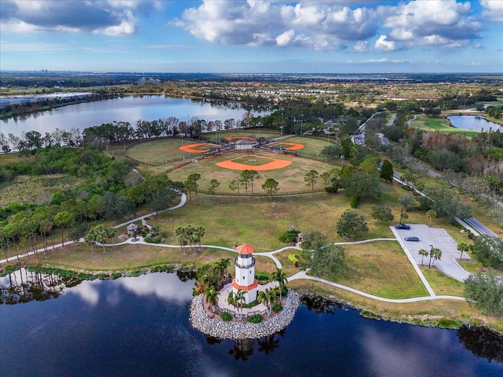 a view of a lake with a yard