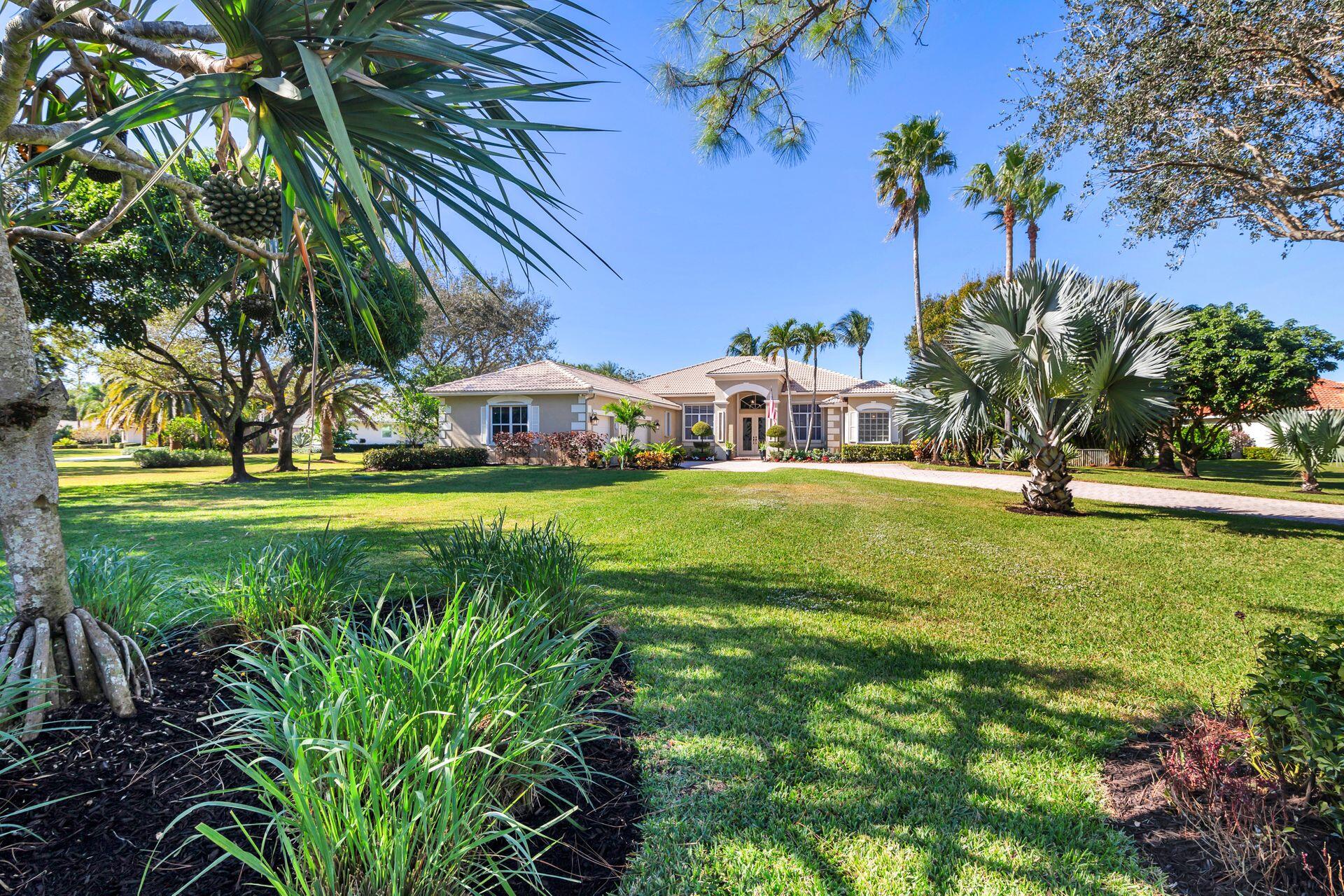 a view of a house with a big yard