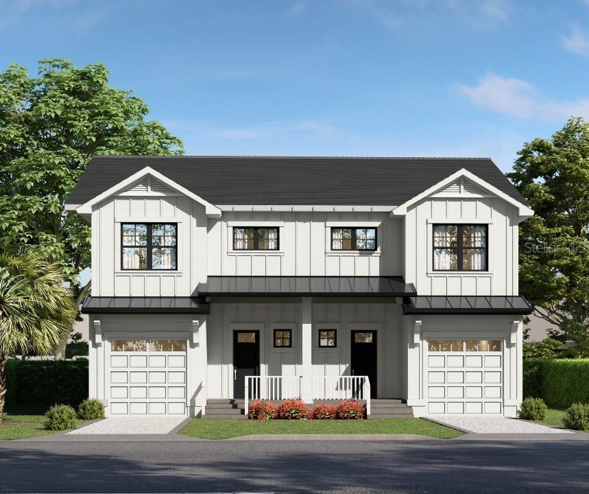 a front view of a house with a garage