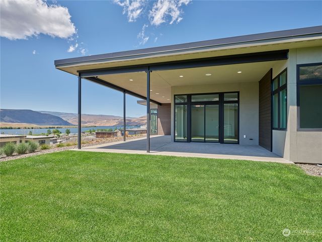 $1,995,000 | 9028 Northwest Tendril Lane | Crescent Bar