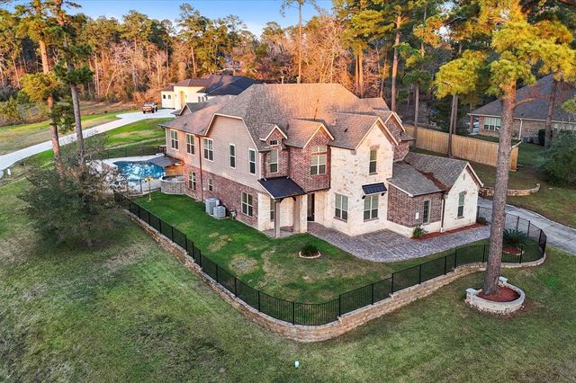 $999,900 | 11014 Branch Creek Court | Conroe