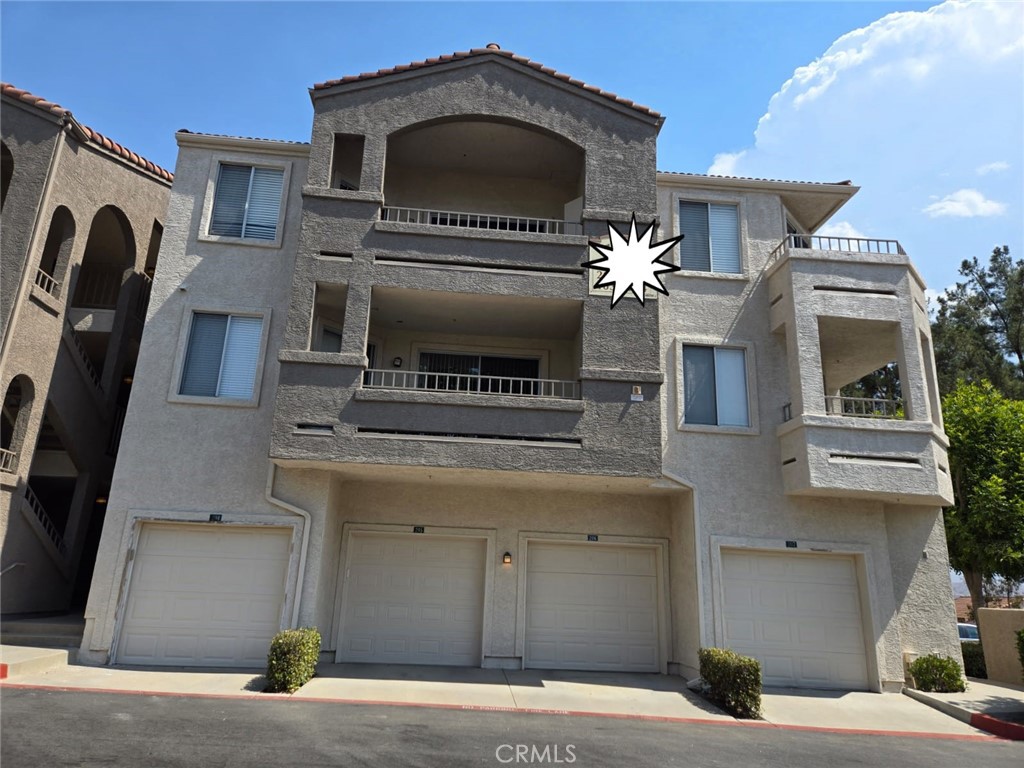 a front view of a house with a garage