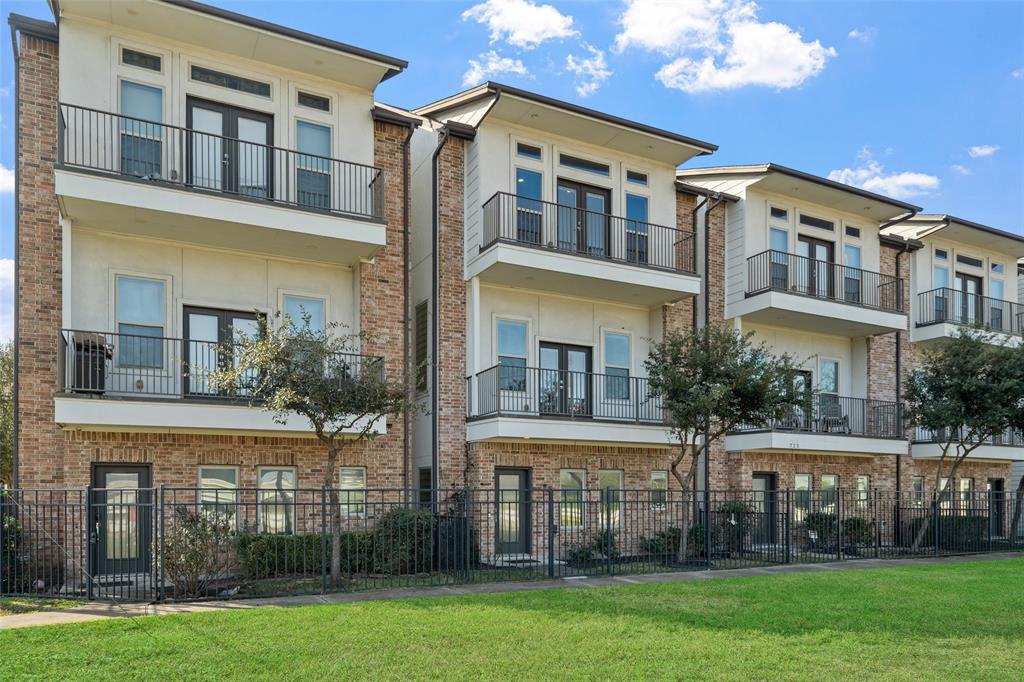 a view of a building with a yard