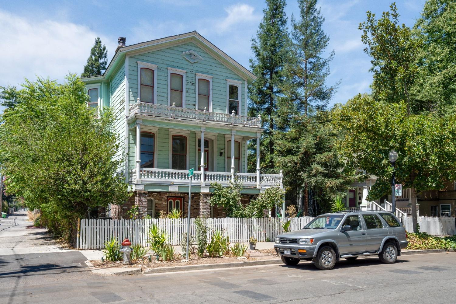 a view of a car parked in front of a house