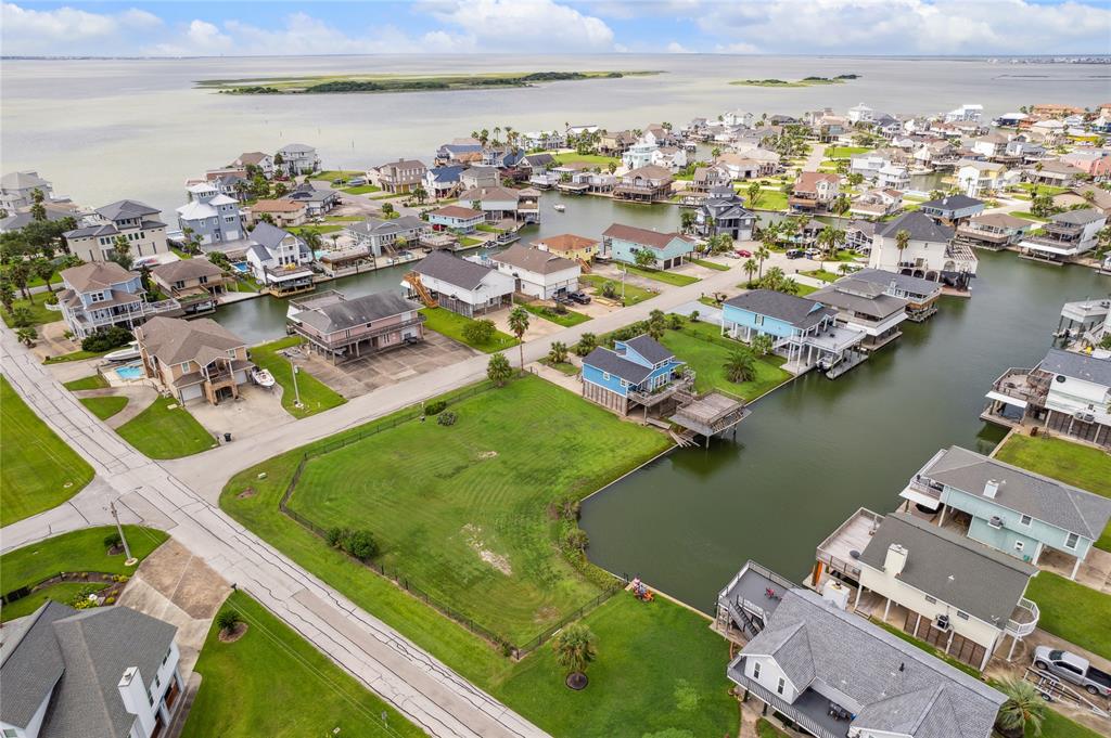 an aerial view of a city with lawn chairs