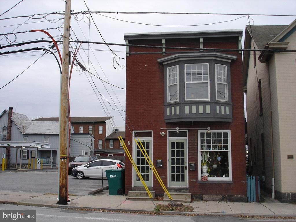 a front view of a building with entryway