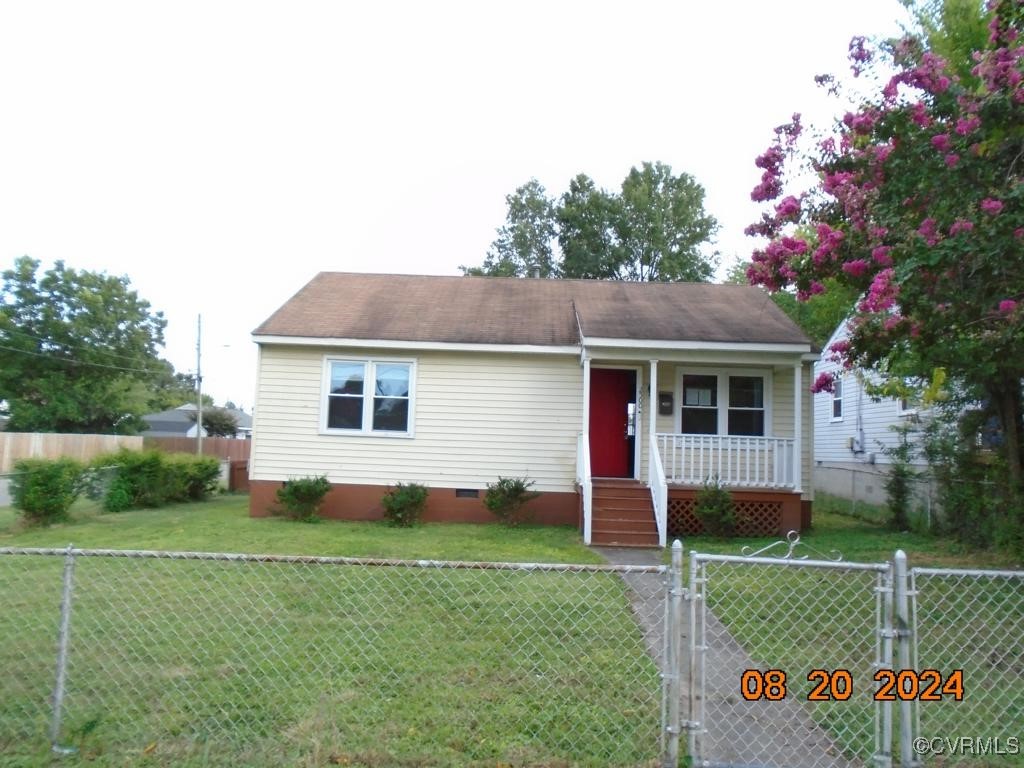 a view of a house with a garden