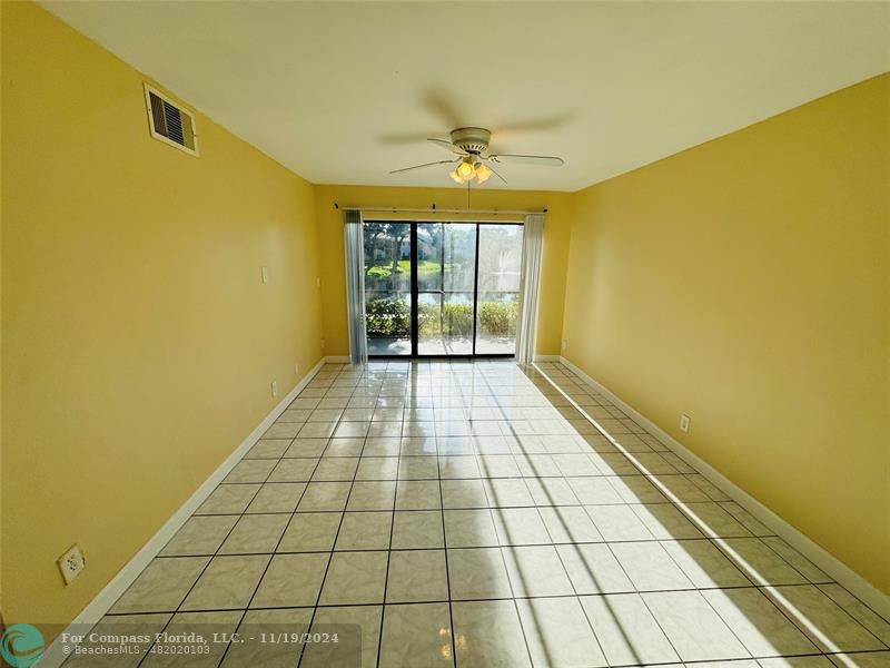 a view of an empty room and window