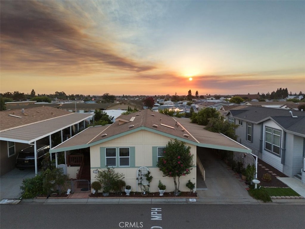 an aerial view of house with yard