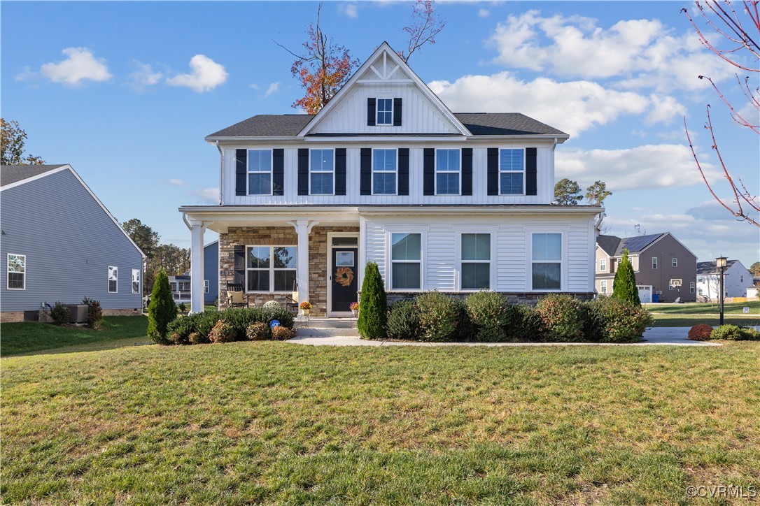 View of front of house featuring covered porch