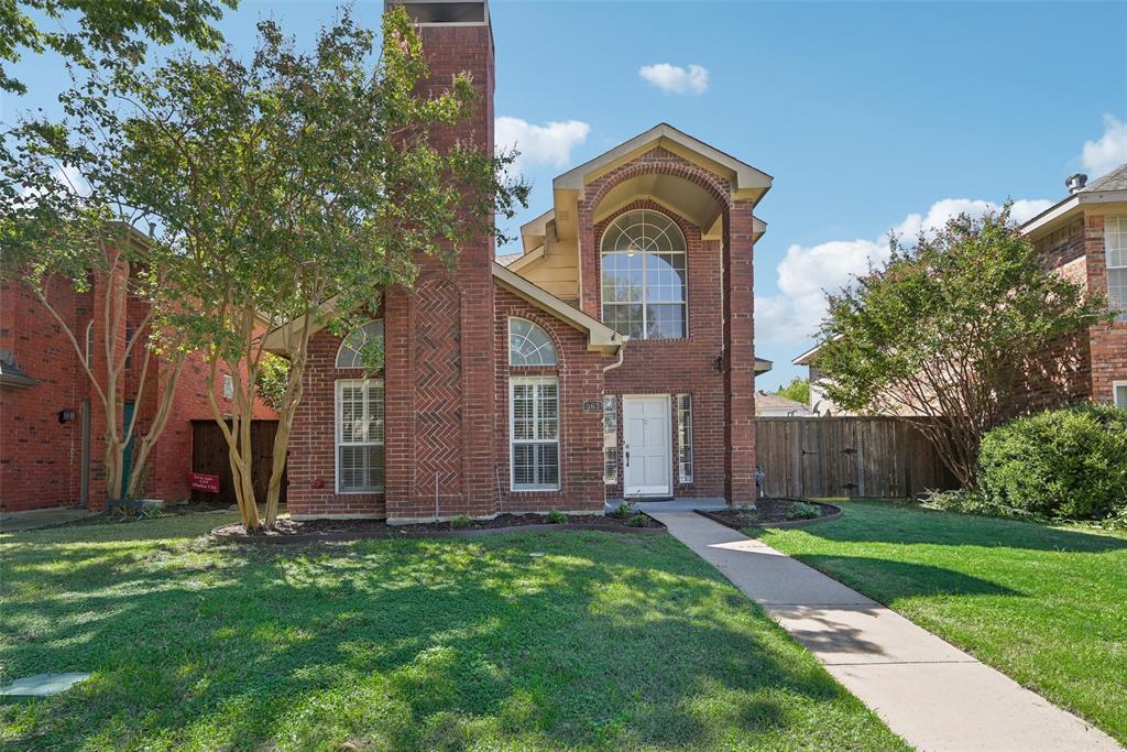 front view of house with a yard