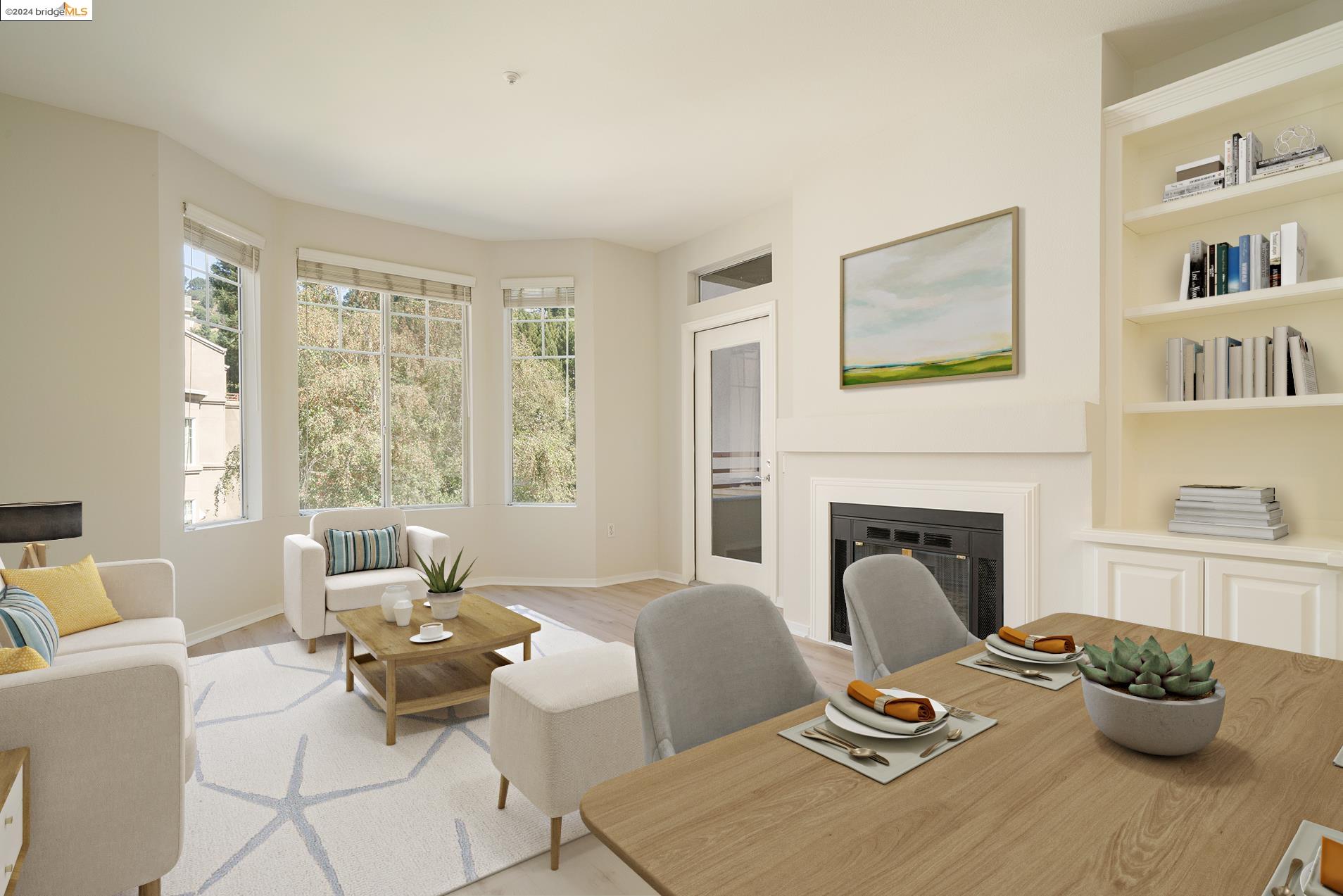 a living room with furniture potted plant and a fireplace