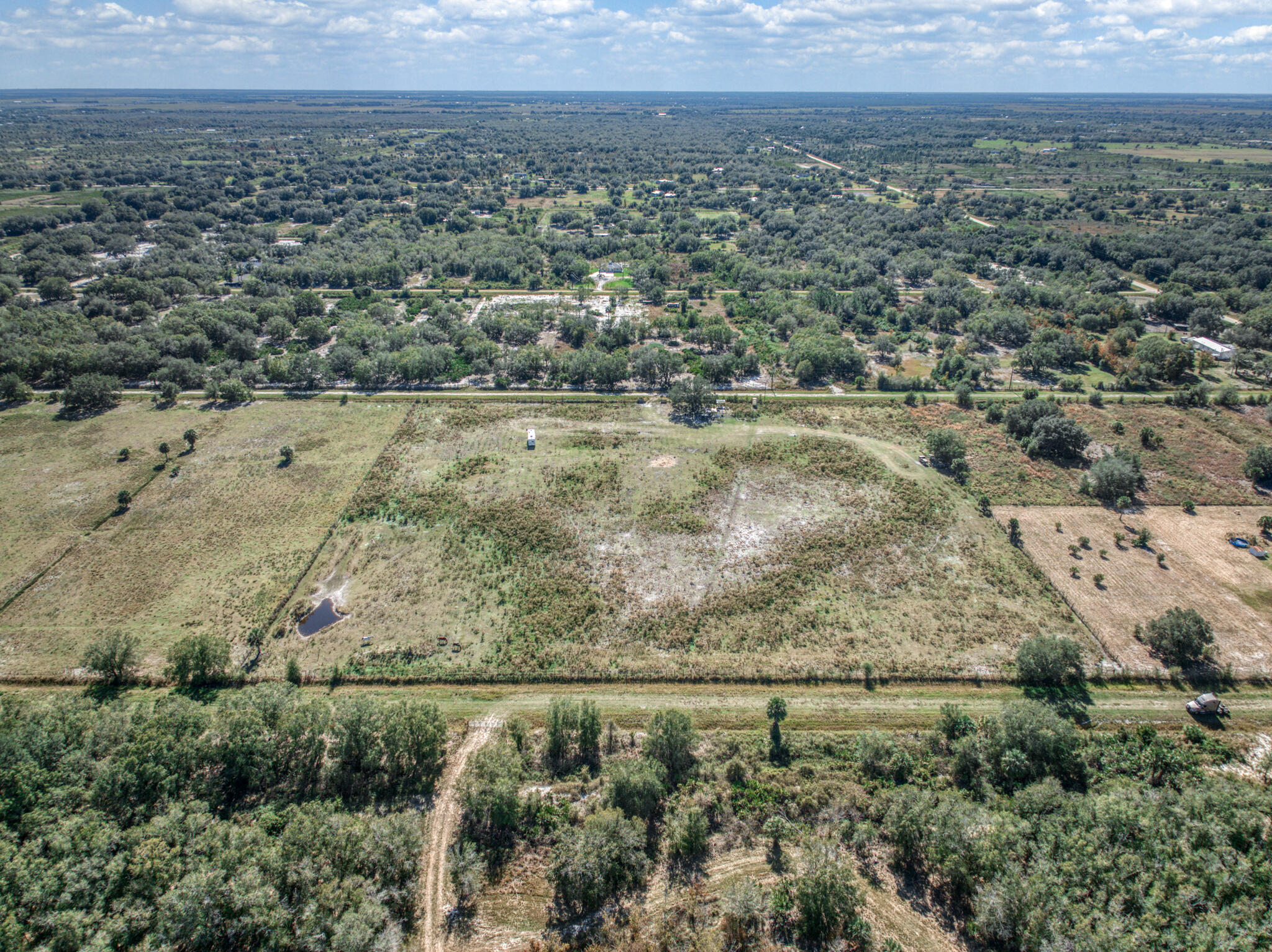 an aerial view of residential house and outdoor space