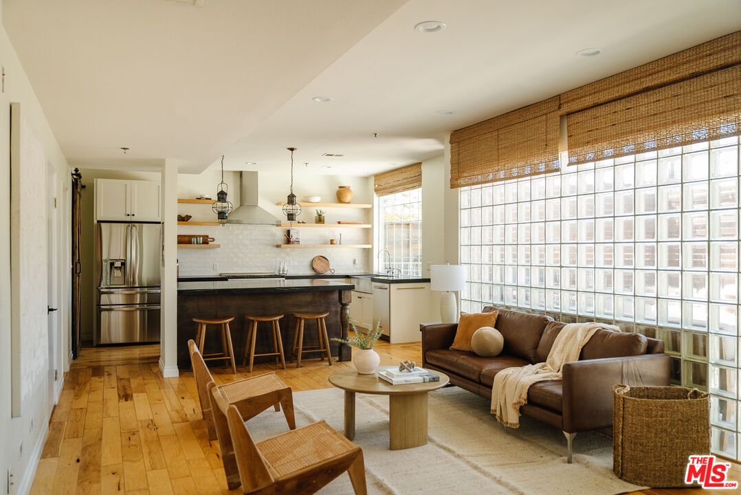 a living room with a couch and a table