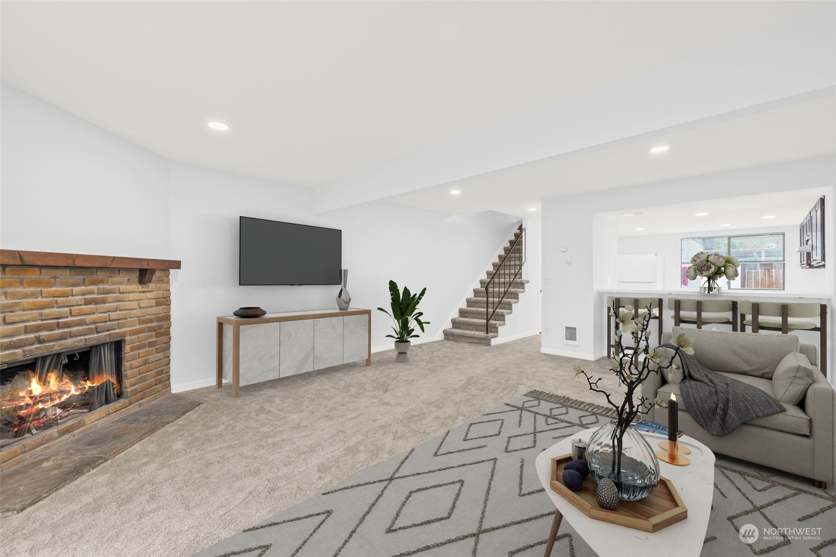 a living room with furniture and a flat screen tv