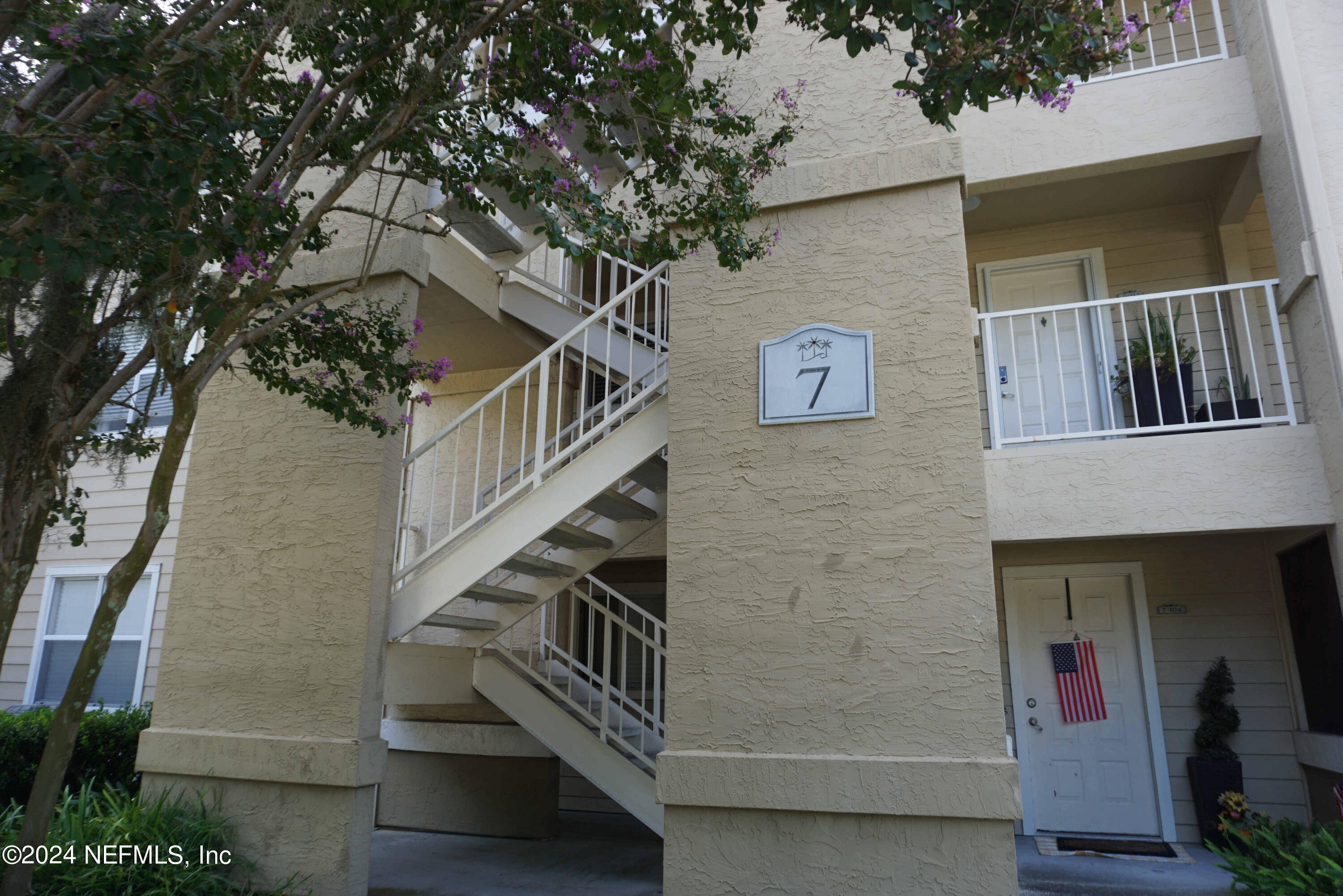 a view of entryway with stairs