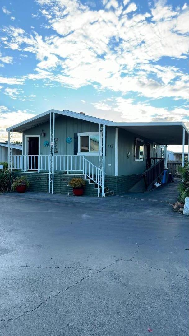 a view of a house with a patio