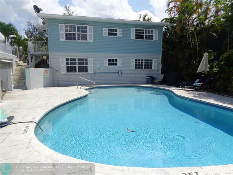 a view of outdoor space yard and swimming pool