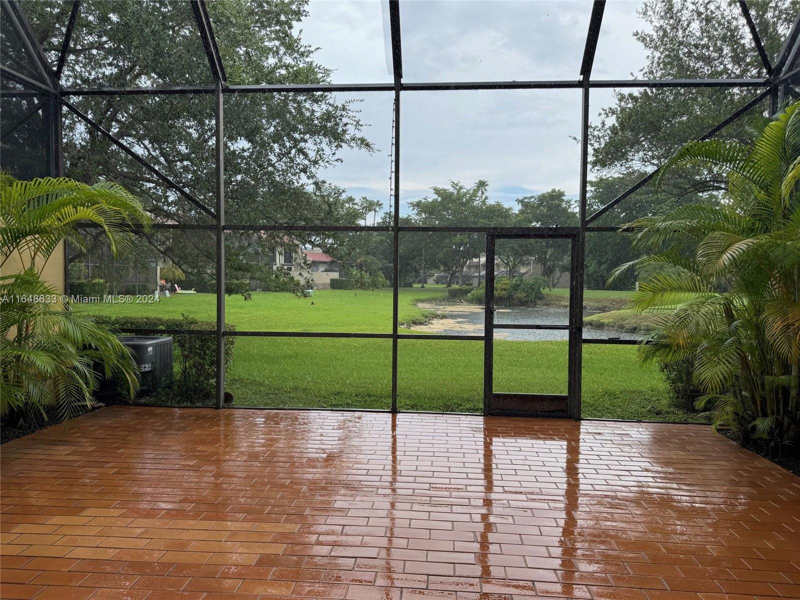 a view of a yard and a play ground