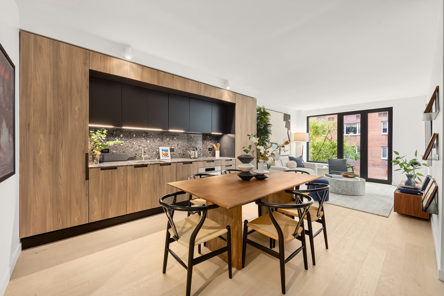 a view of a dining room with furniture and window