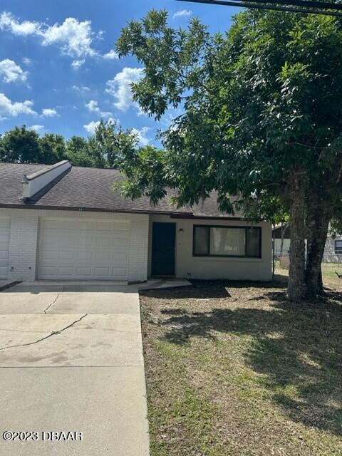 a view of a house with a garage