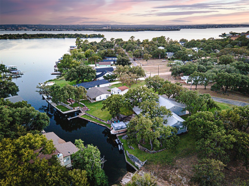 a view of a lake with a city