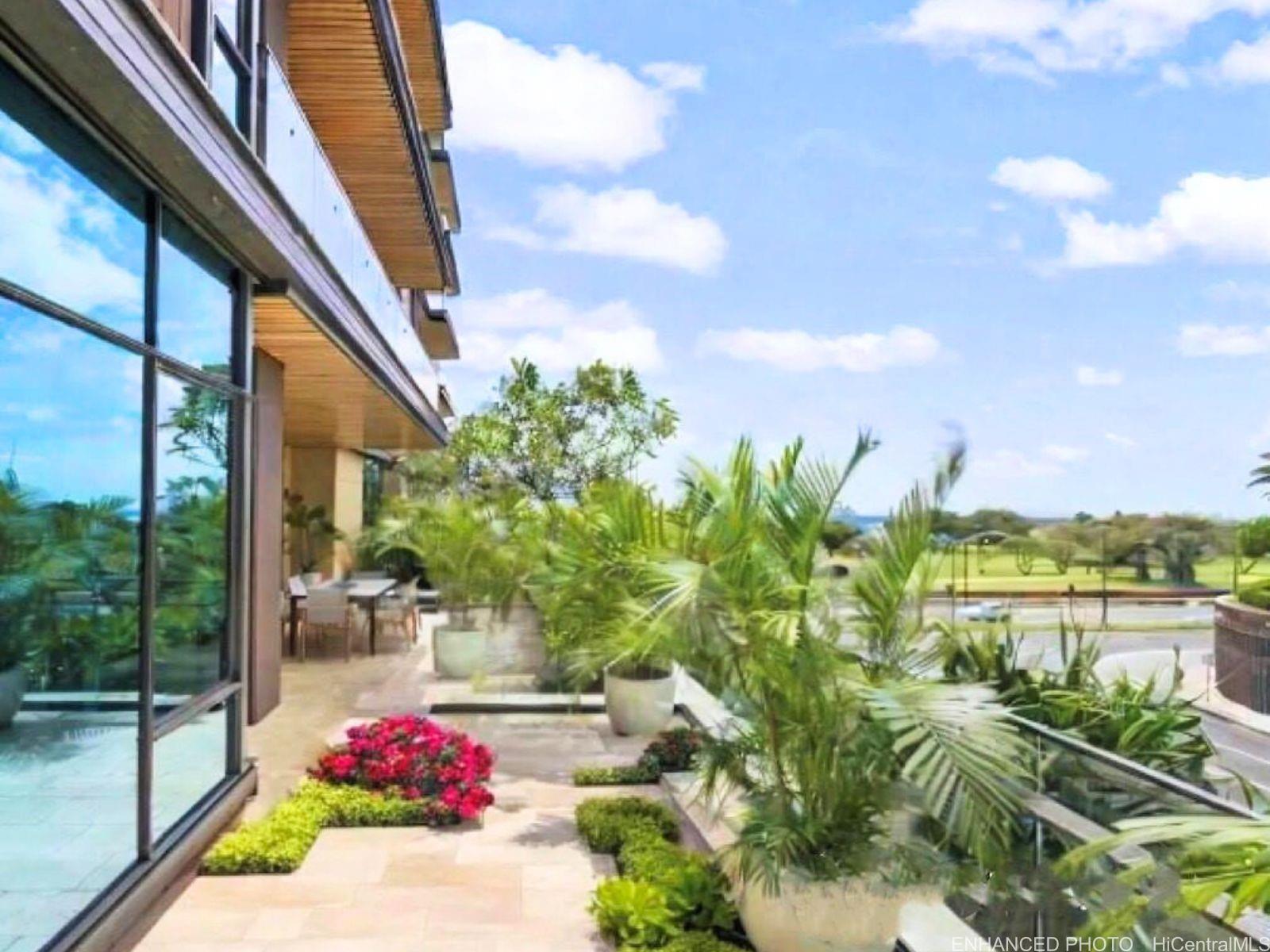 a view of yard with an outdoor seating