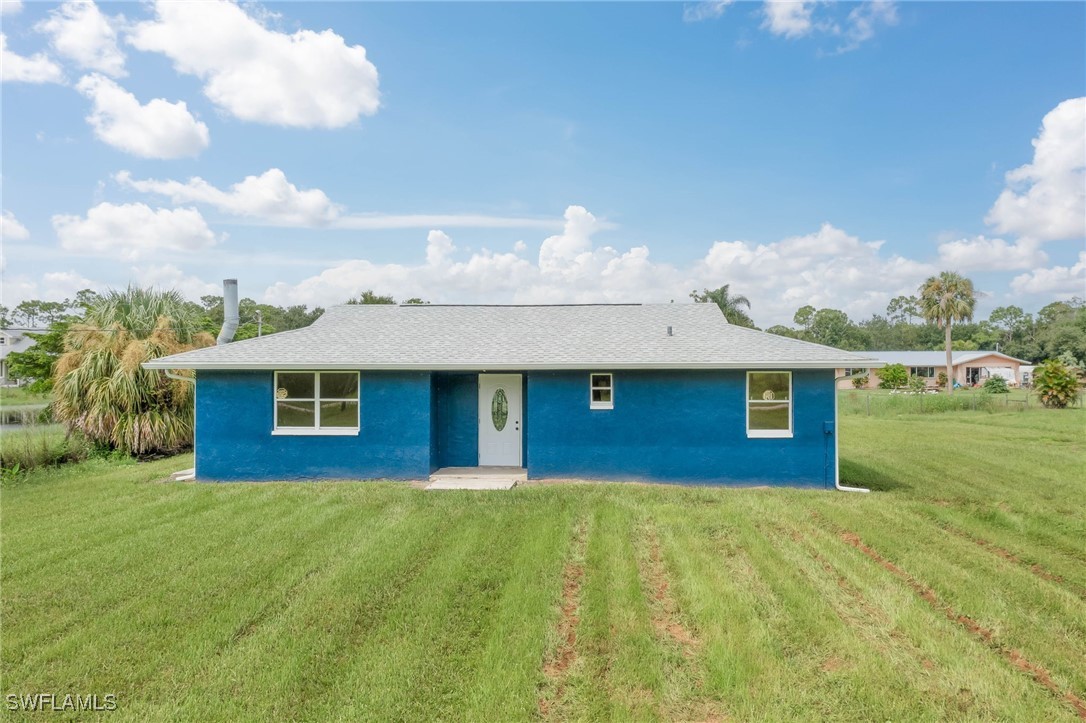 a front view of house with yard