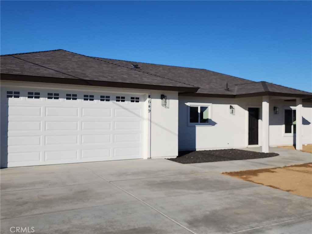 a view of a house with a garage