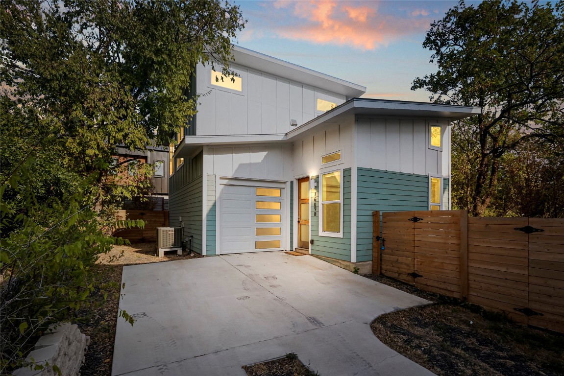 a view of a house with a garage