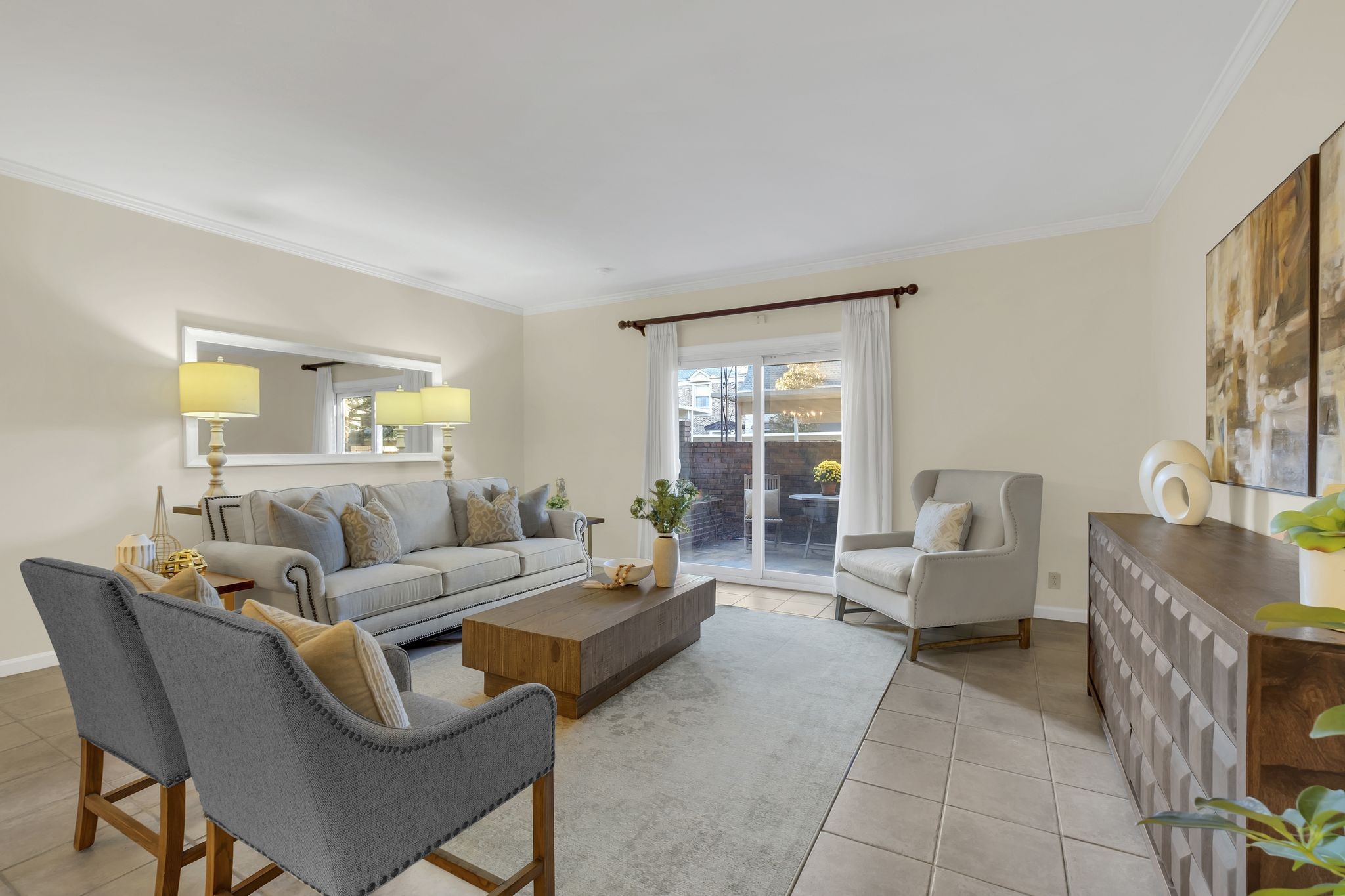 a living room with furniture and a table