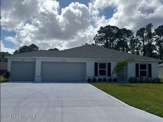 front view of a house with a yard