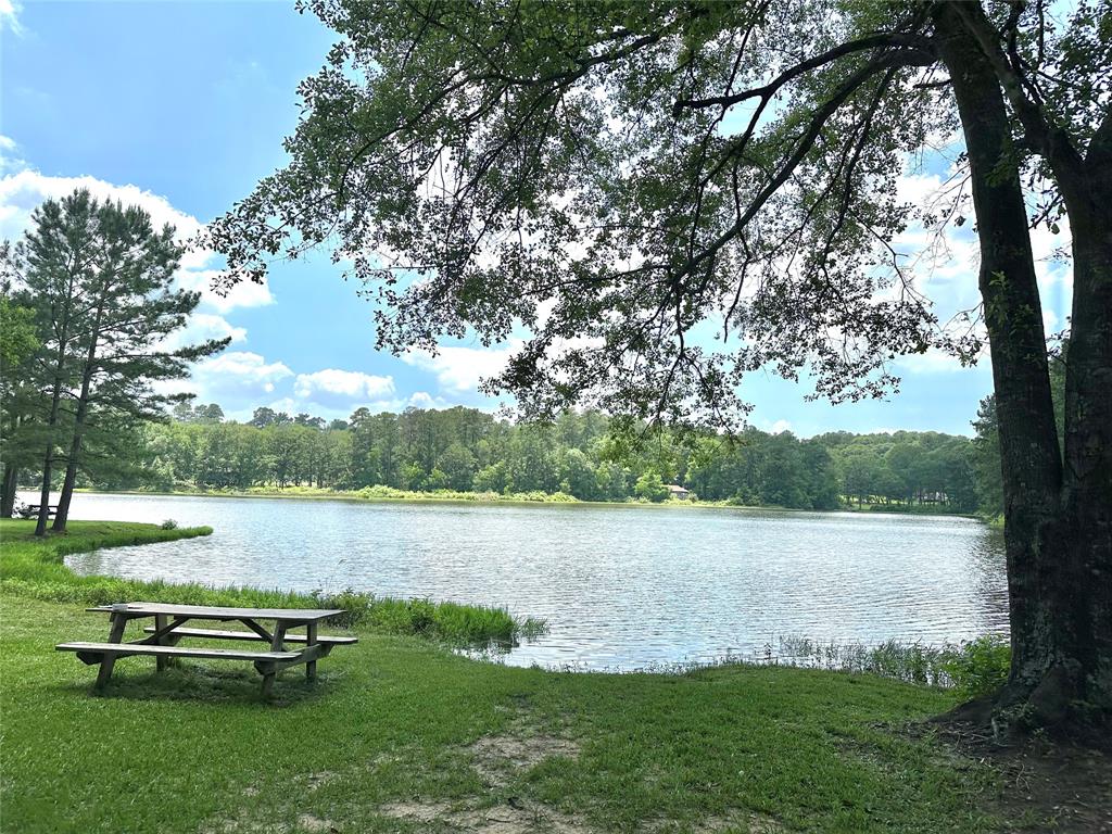 a view of a lake with outdoor space