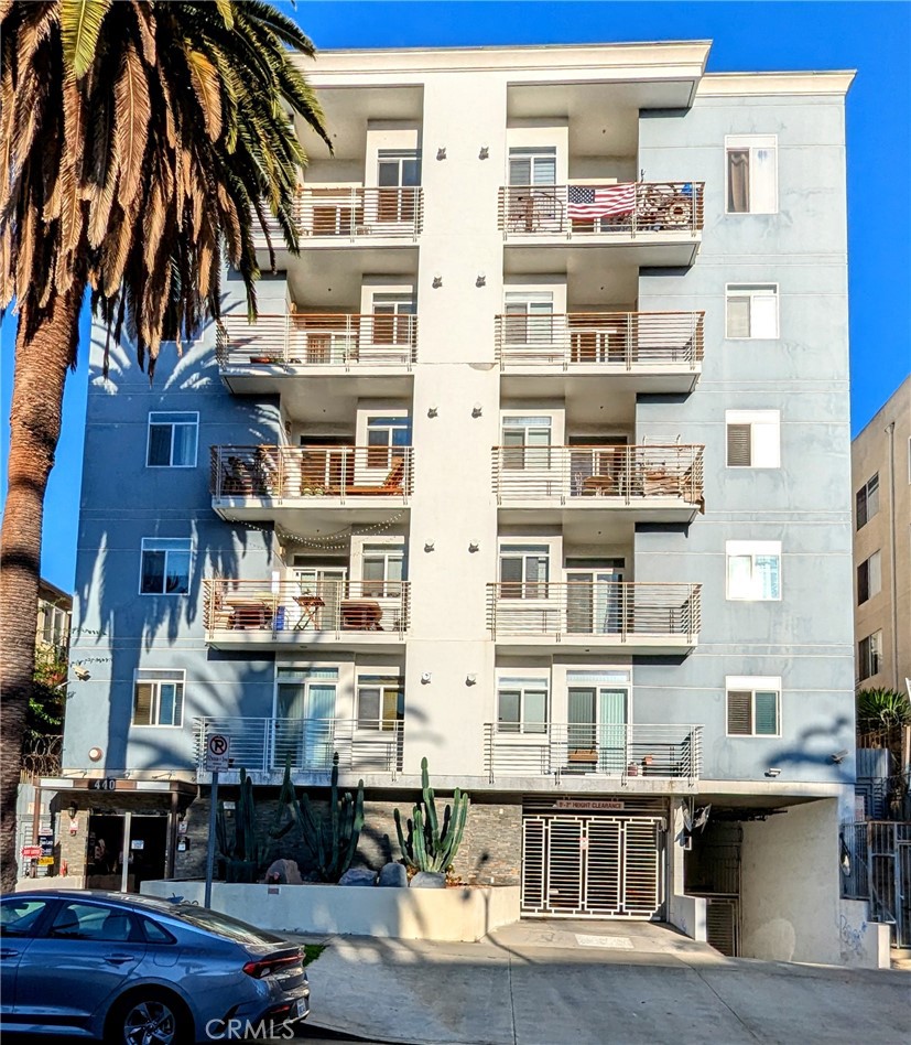 a front view of a building with a street