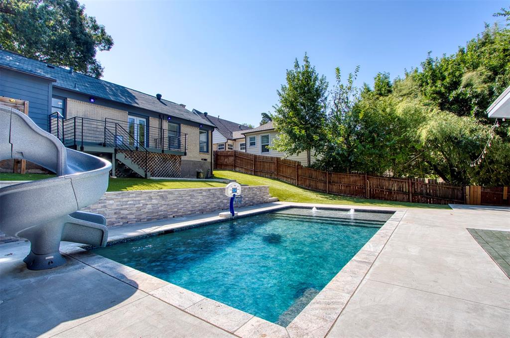 a view of a house with swimming pool