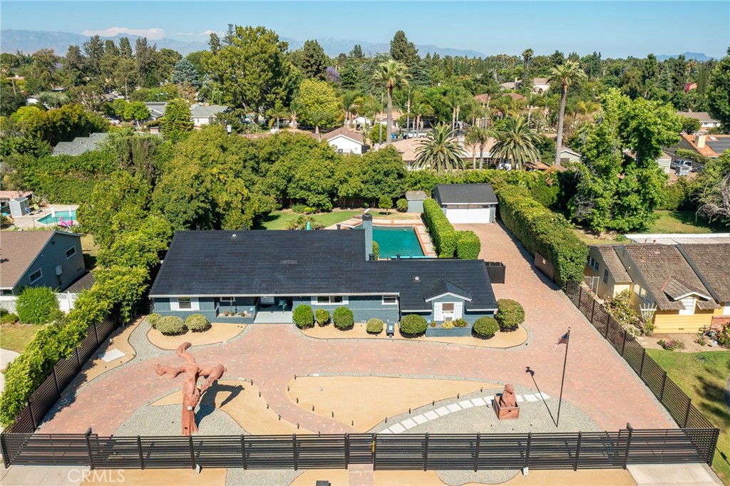 an aerial view of house with yard