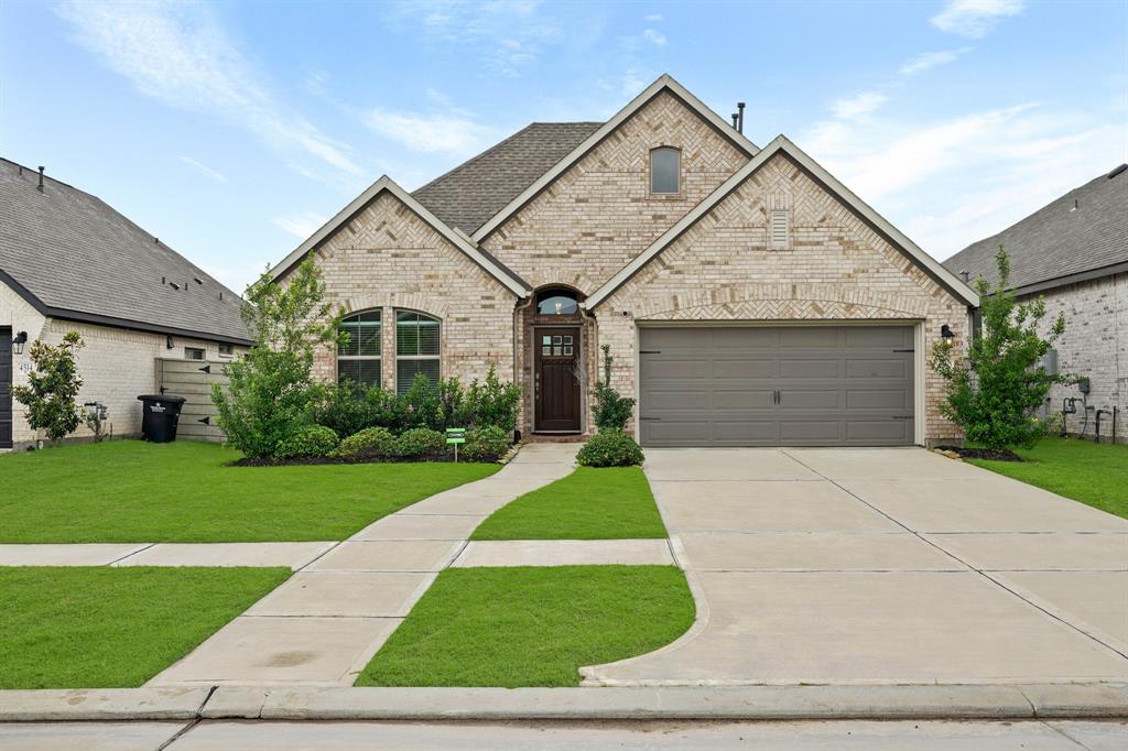 Welcome home to 4510 Cedar Butte Lane - a master-planned community in Manvel, TX!