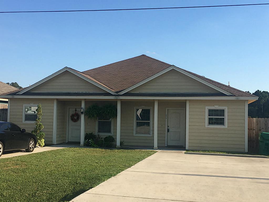 Front view of duplex with the unit for 147a being on the left side.