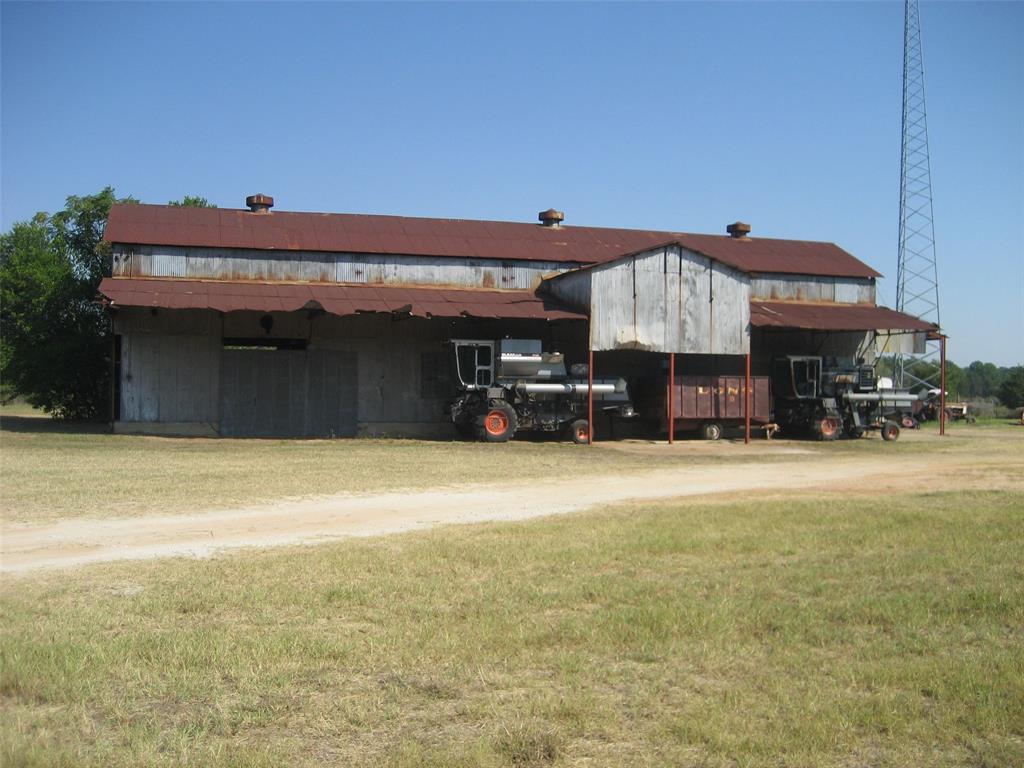 a front view of a house with large windows