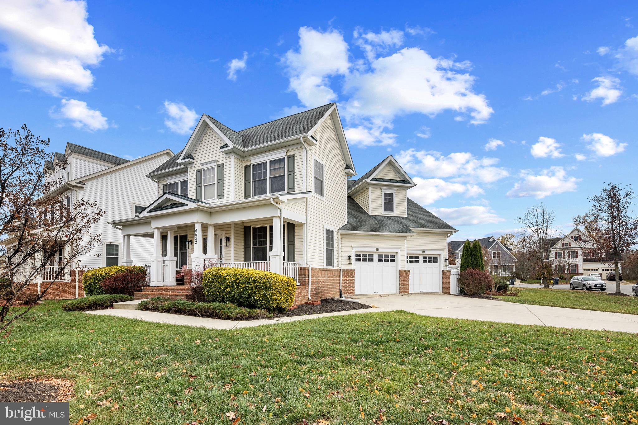 a view of house with yard and entertaining space