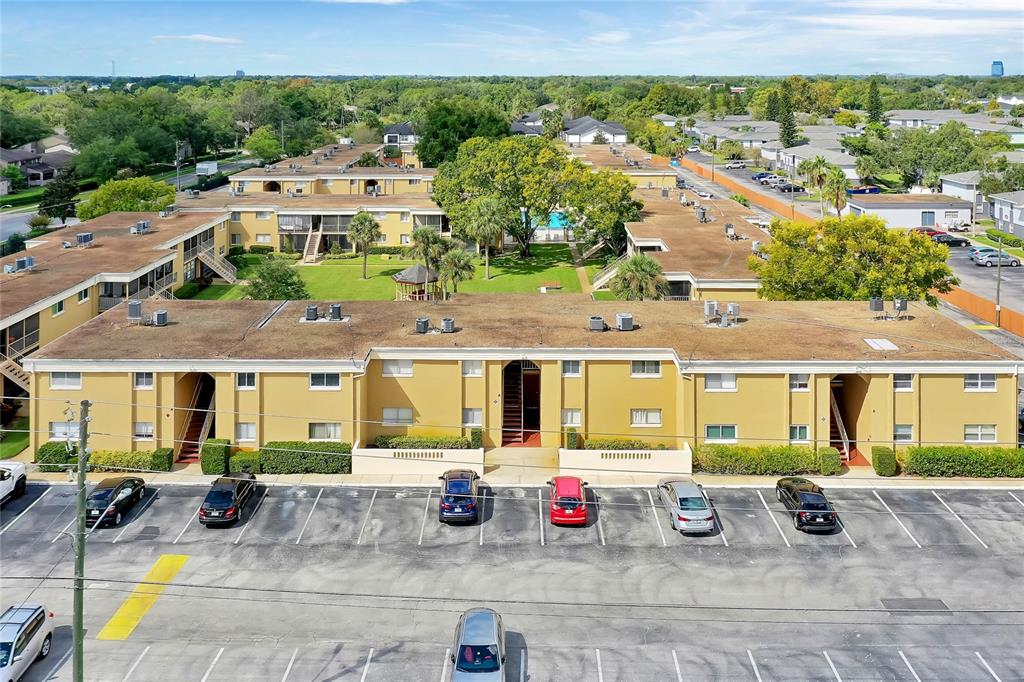 an aerial view of residential houses and outdoor space