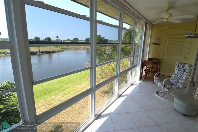 a view of balcony with furniture