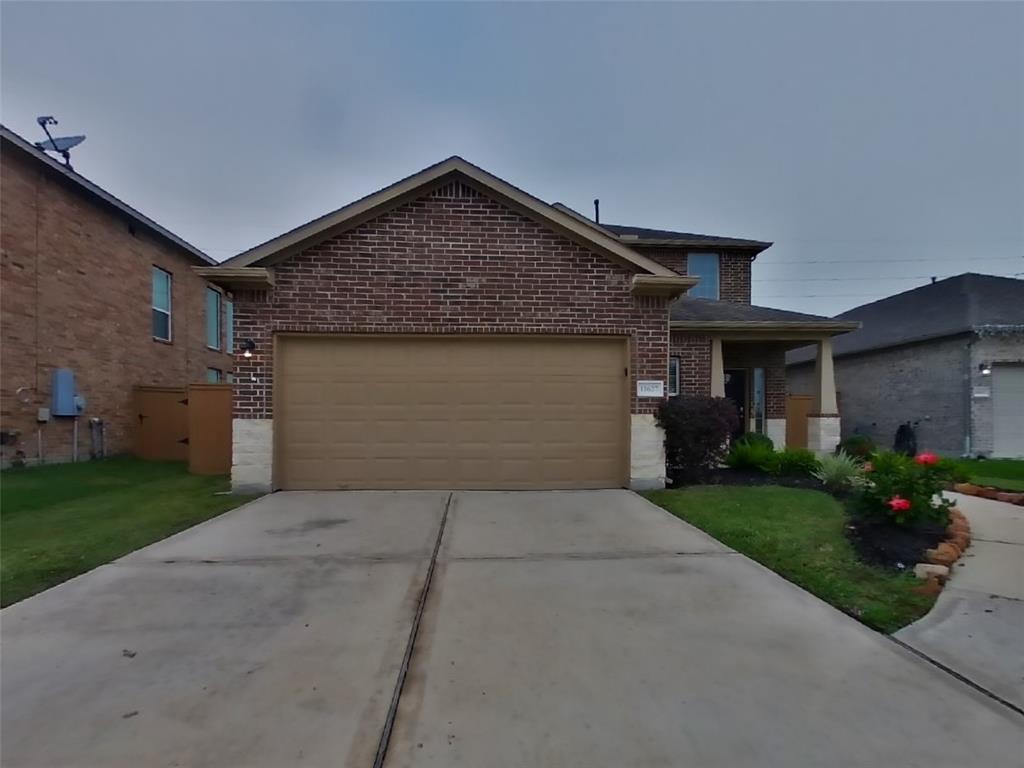 a front view of house with yard