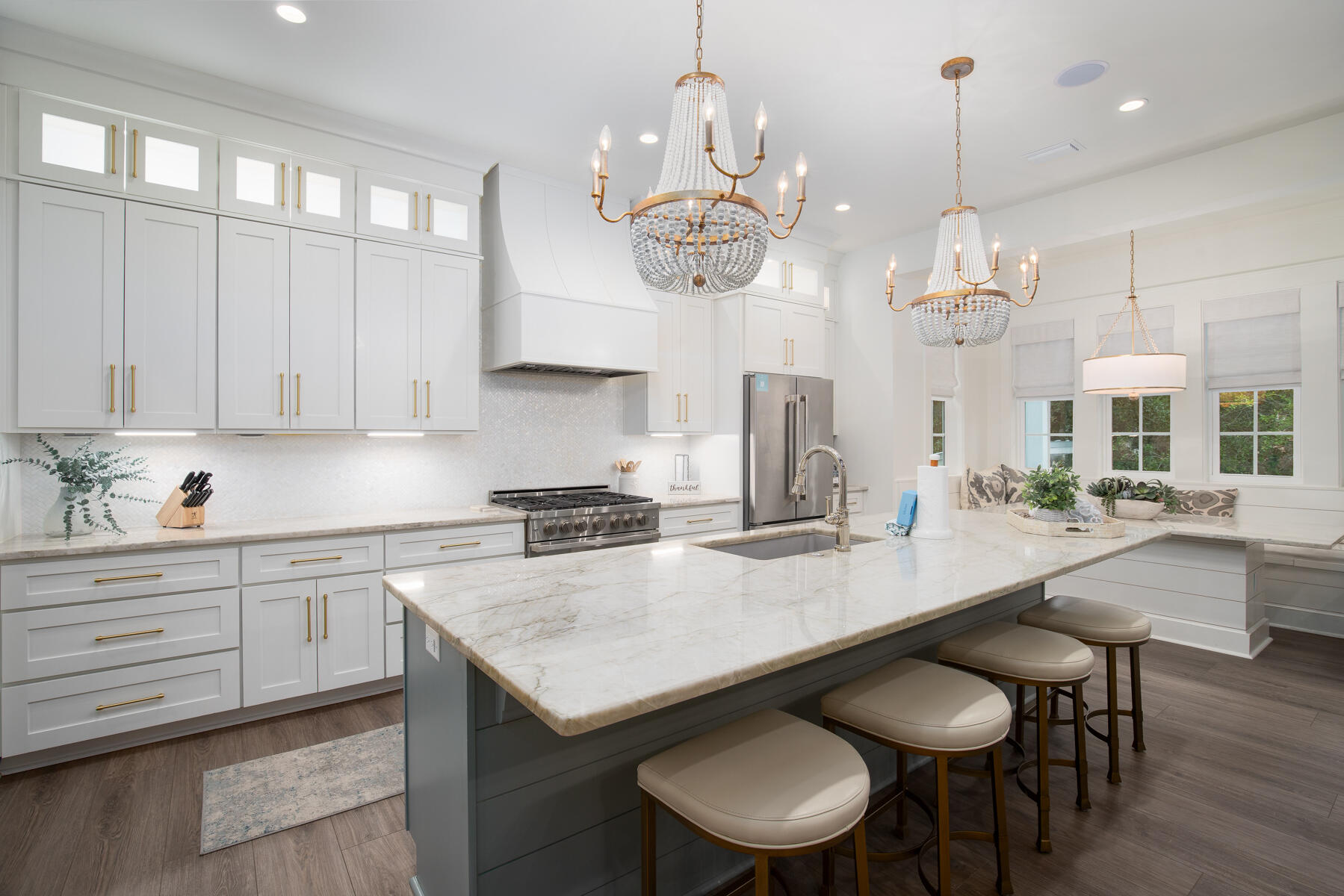 a kitchen with a table and chairs in it