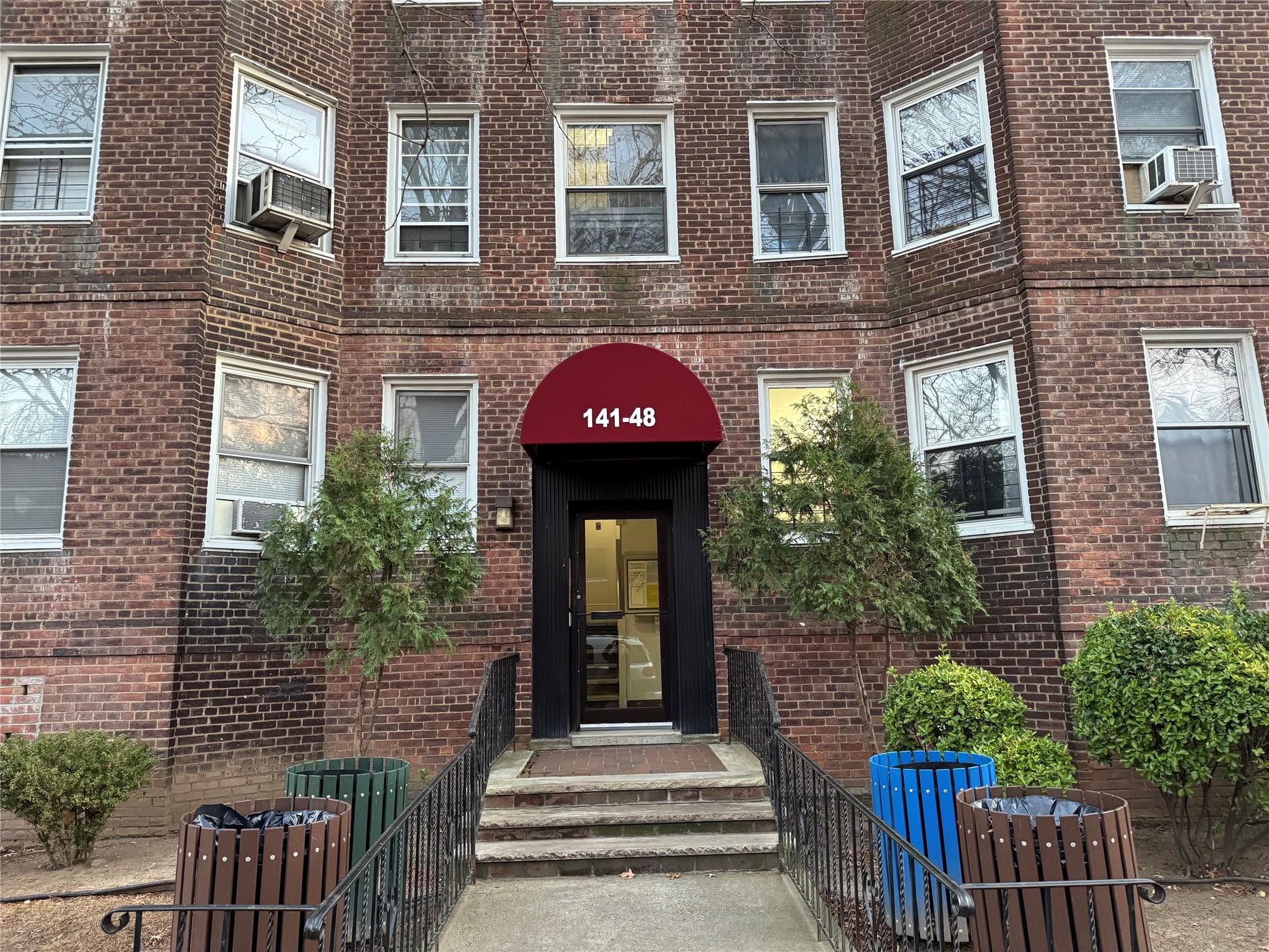 Doorway to property featuring cooling unit