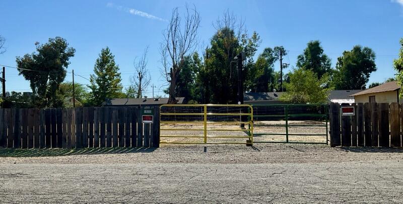 a view of park with wooden fence