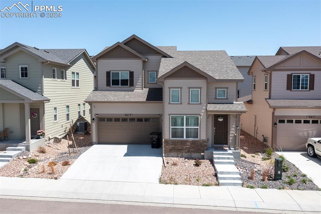 a front view of a house with entertaining space