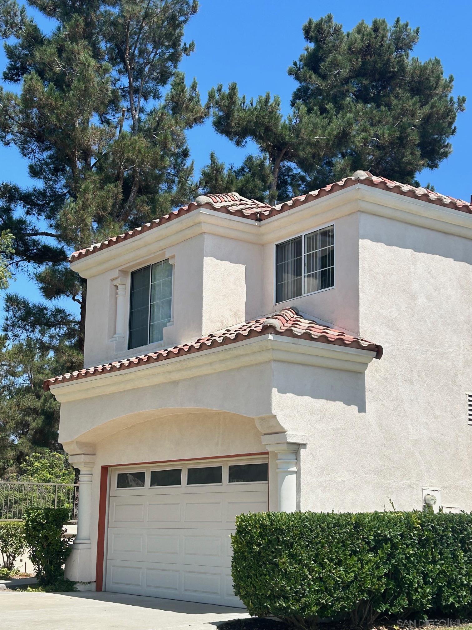 a view of house with outdoor space