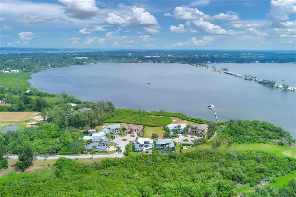 a view of a lake with a yard