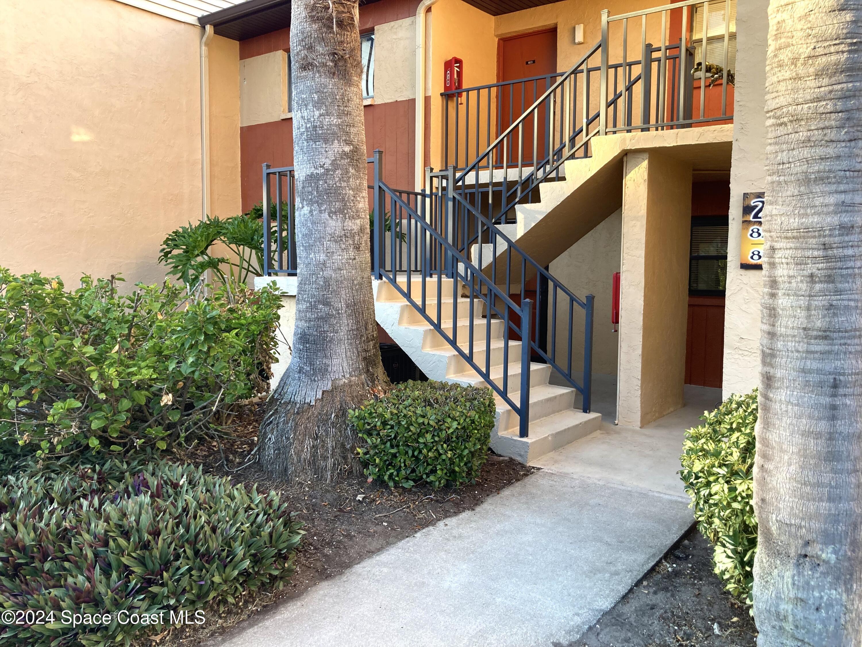 a view of a pathway of the house front of house